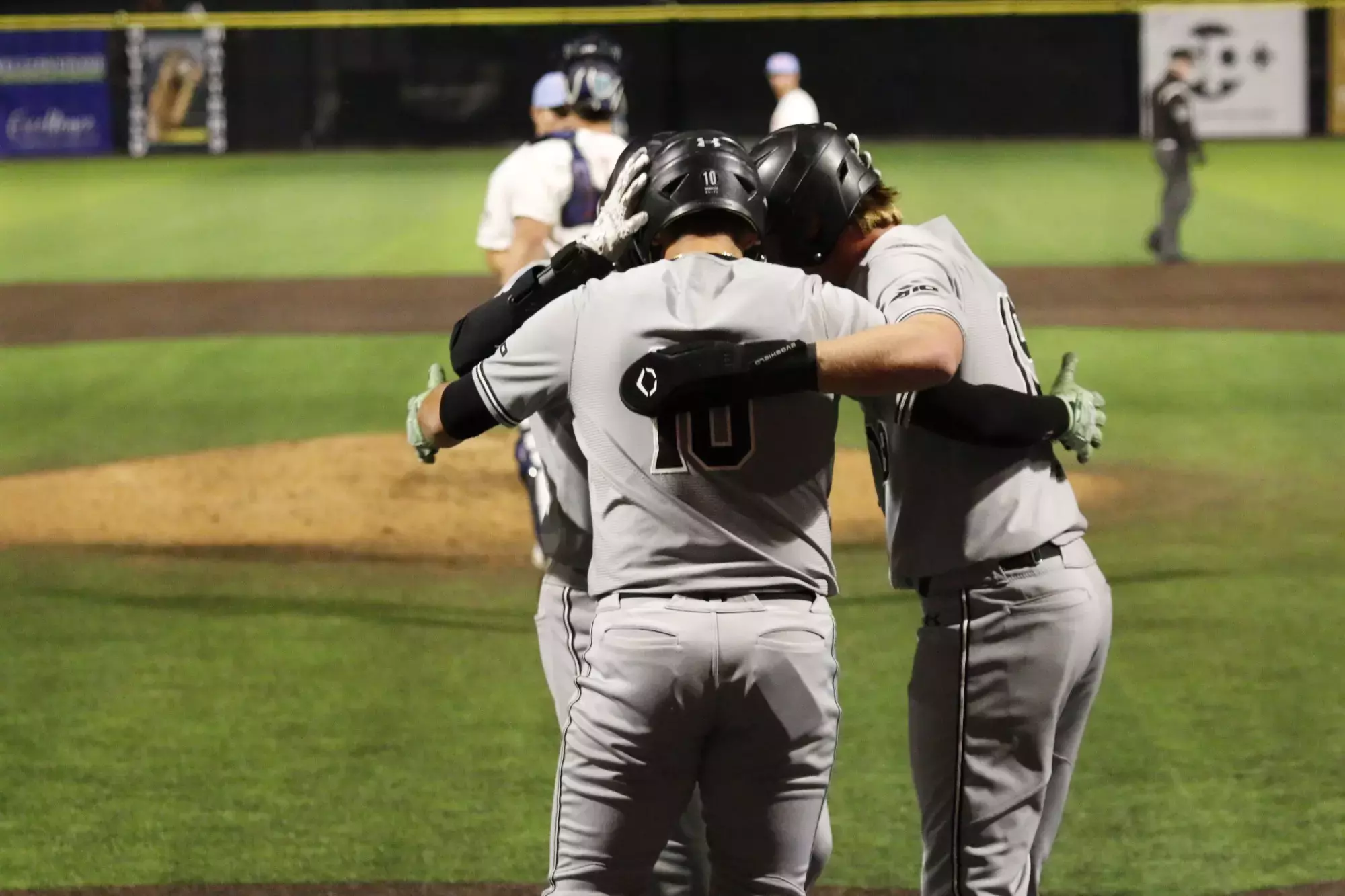 HR celebration 25 A-10 tournament vs Dayton