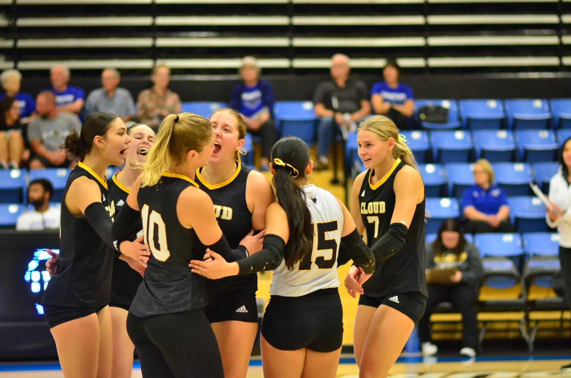 Cloud County Volleyball Team Celebrates Point at Barton Community College