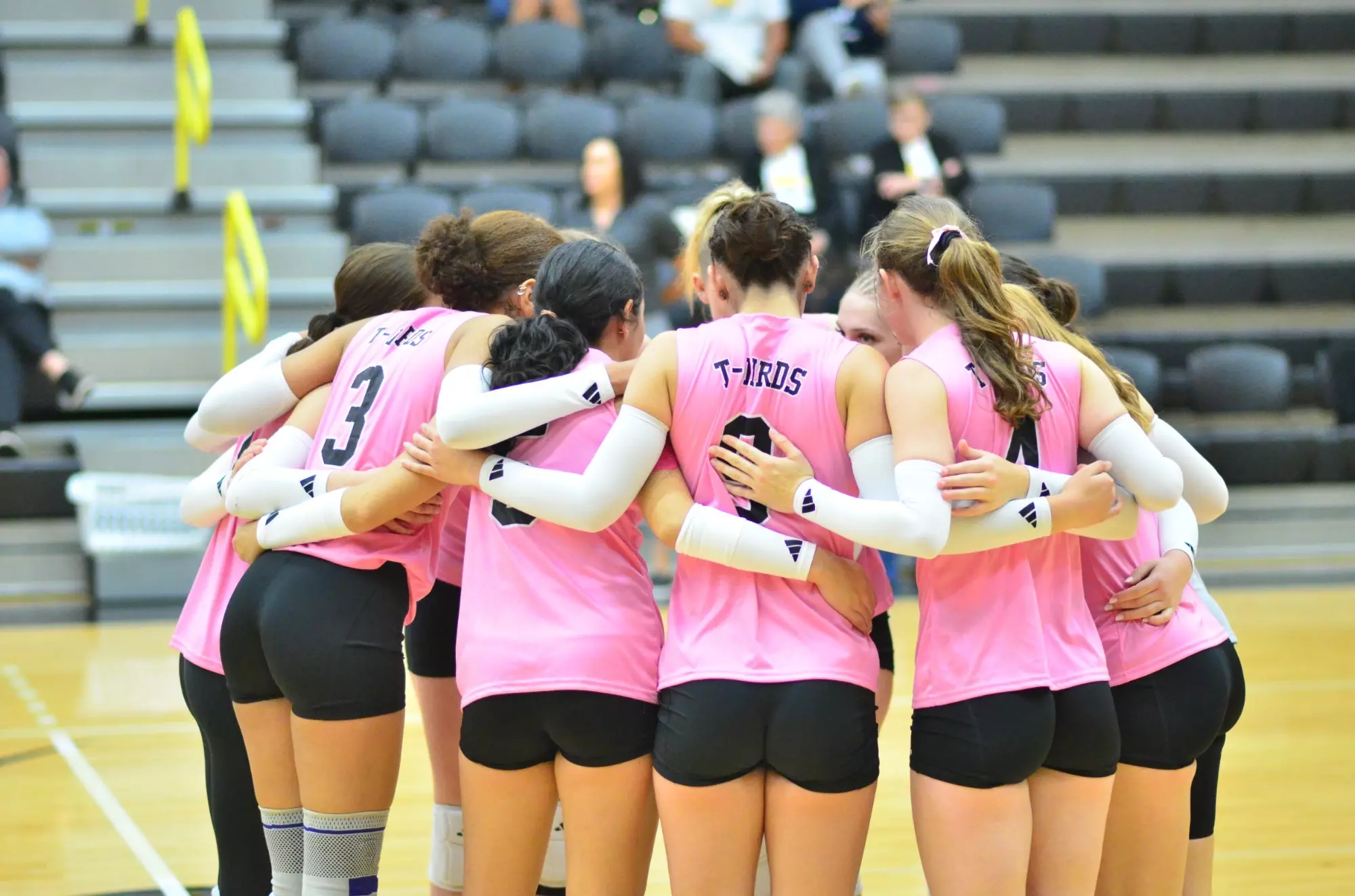 Cloud County Volleyball Team Huddled vs Colby - 2025