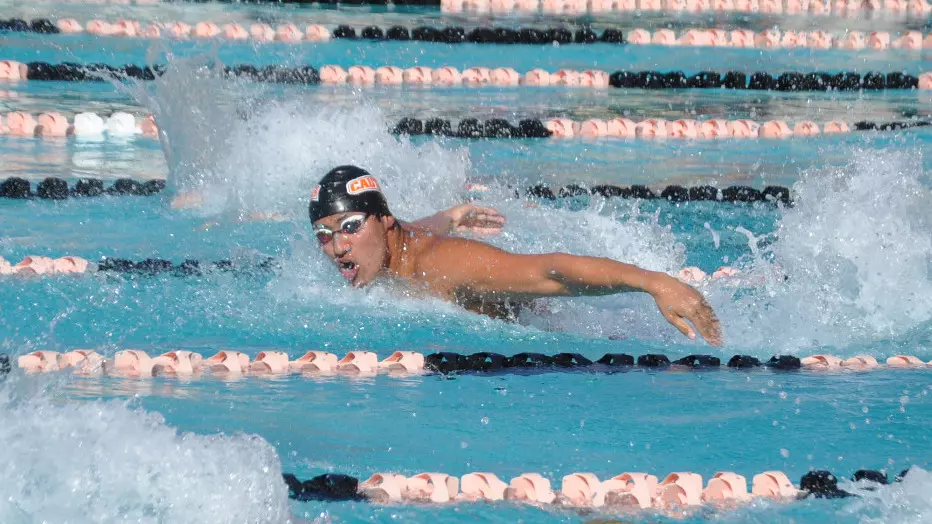 A Caltech men's butterfly swimmer competes in the Occidental Invite