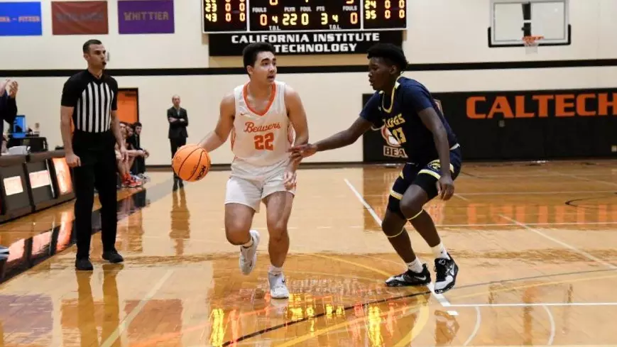 Kyle McGraw dribbling against a UC Santa Cruz defender
