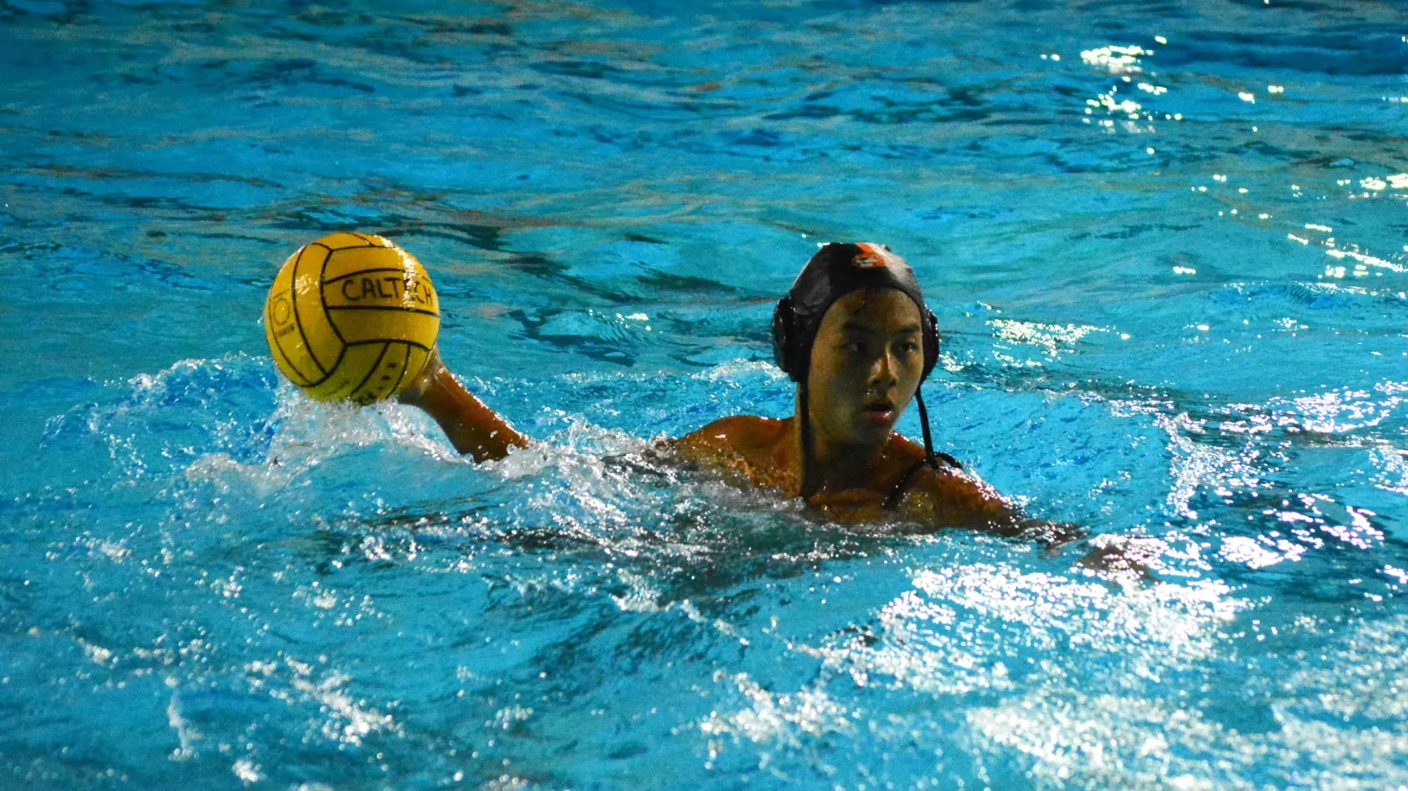 Rex Lieu calmly controls the ball during a night game