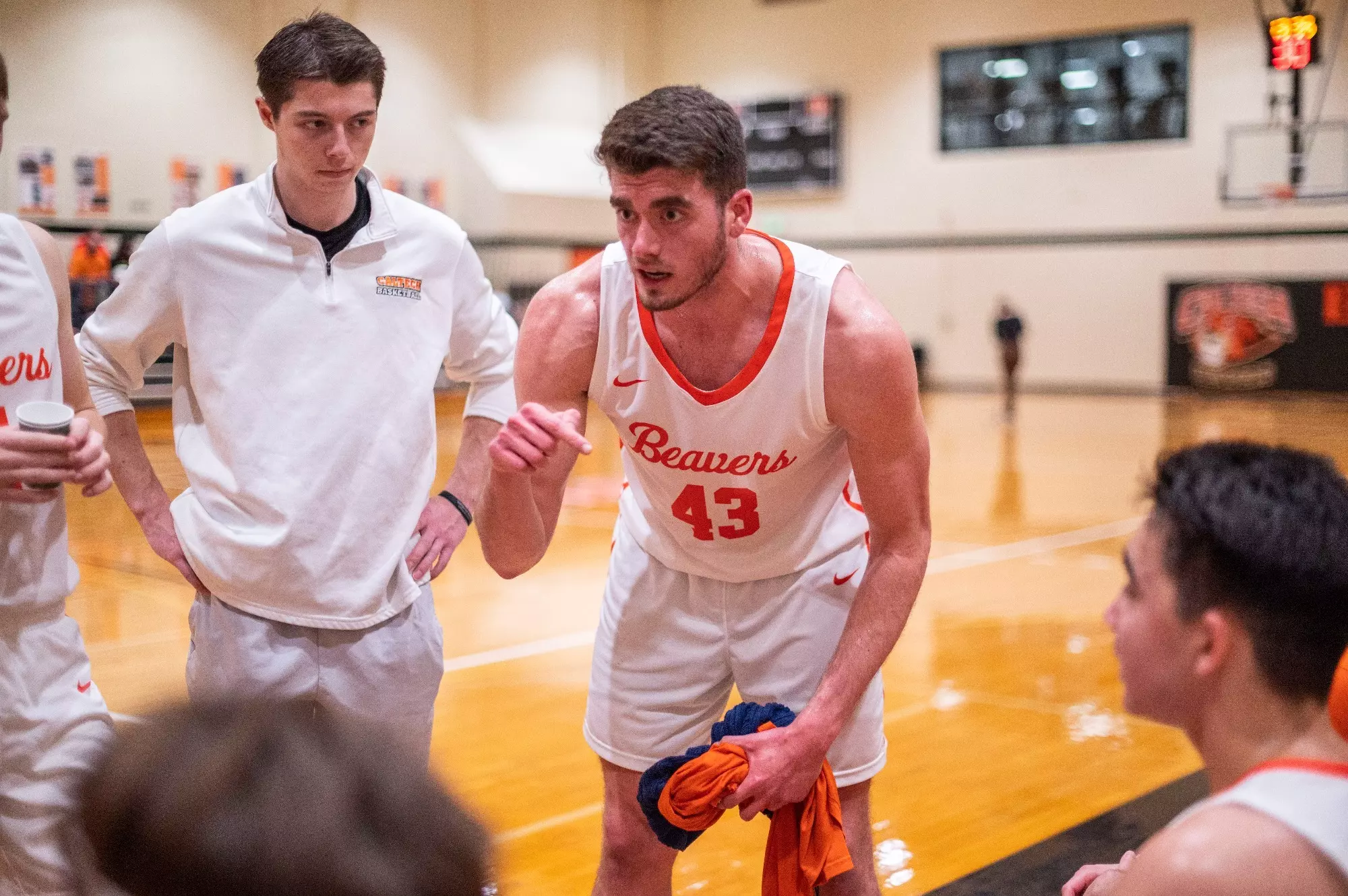 Pavlos Stavrinides talks with his teammates during a timeout