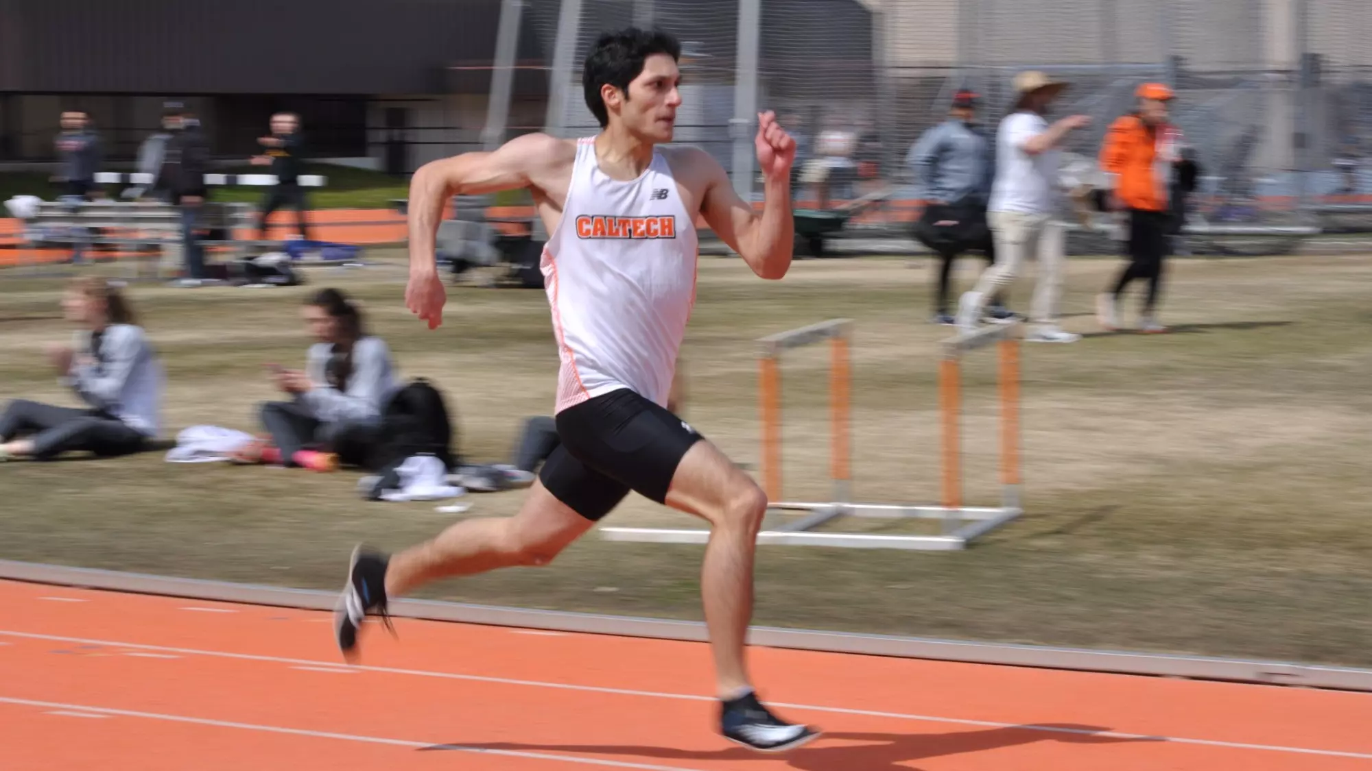 Caltech men's track action shot
