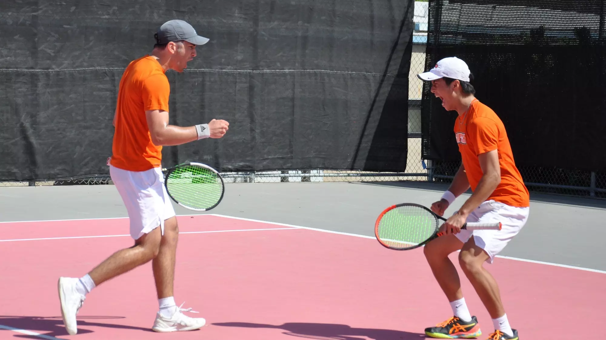 Andrei Staicu and Nathan Zou celebrate a win