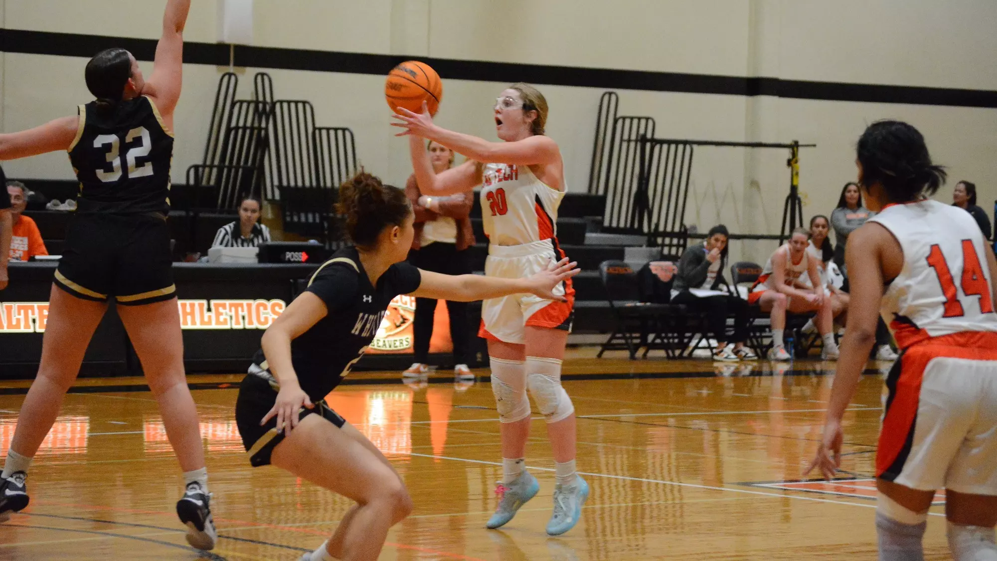 Kodie Vondria attempts a three-point shot against Whittier College