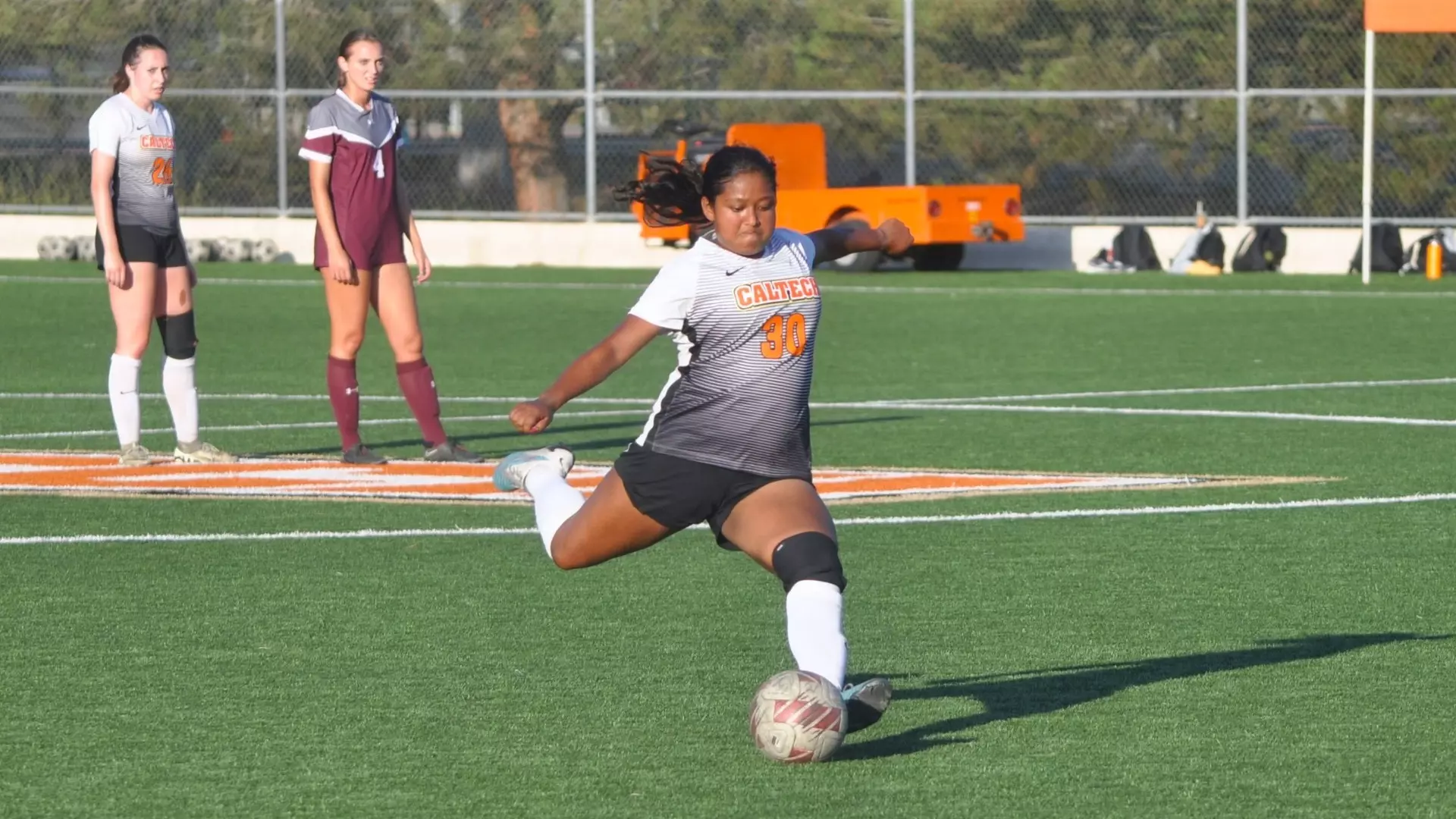 Caltech women's soccer's Meher Banik kicking the ball on a set piece in the team's 10-09-2024 game versus Redlands