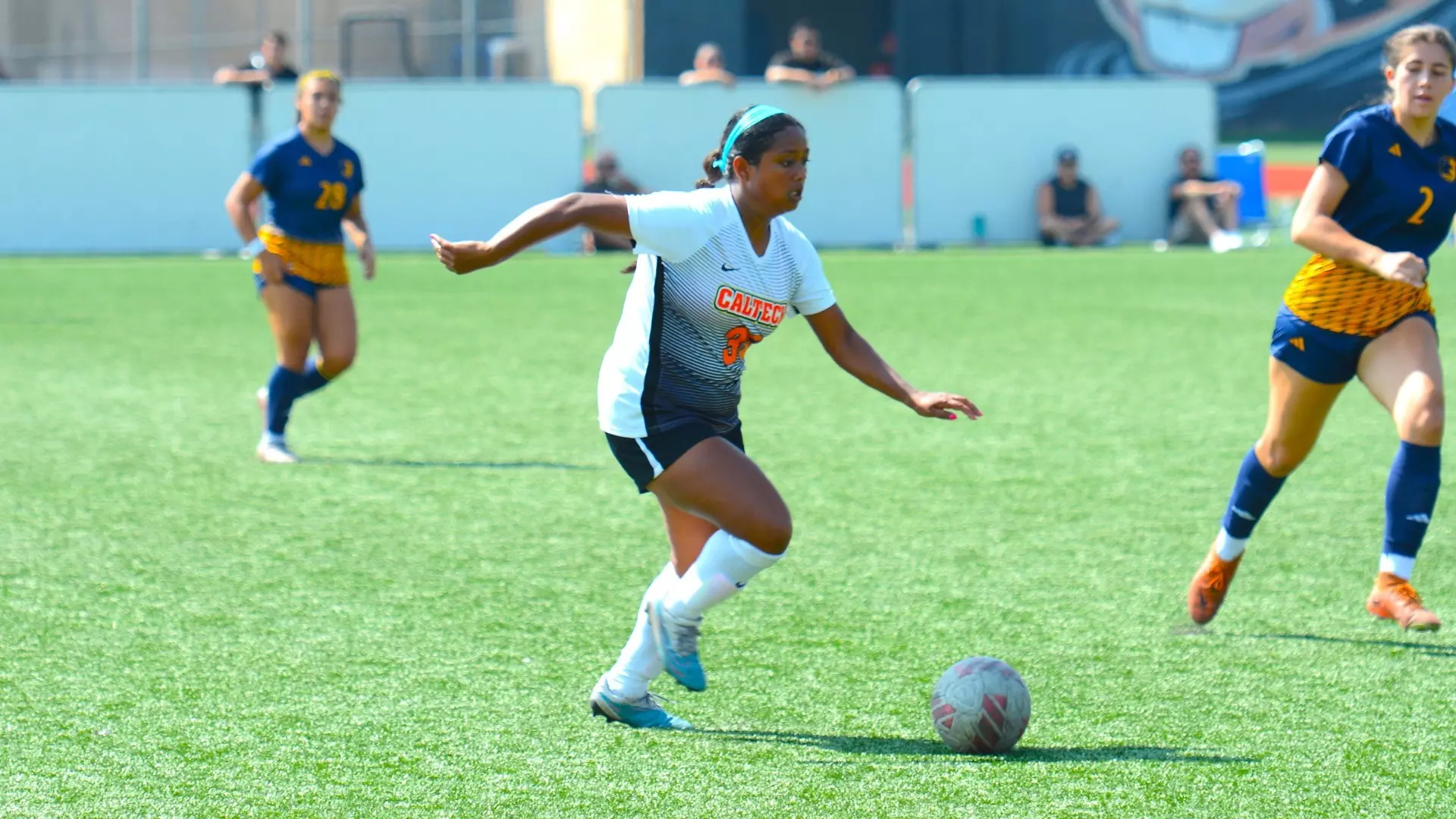 Meher Banik of Caltech Women's Soccer dribbling during a 2024 game