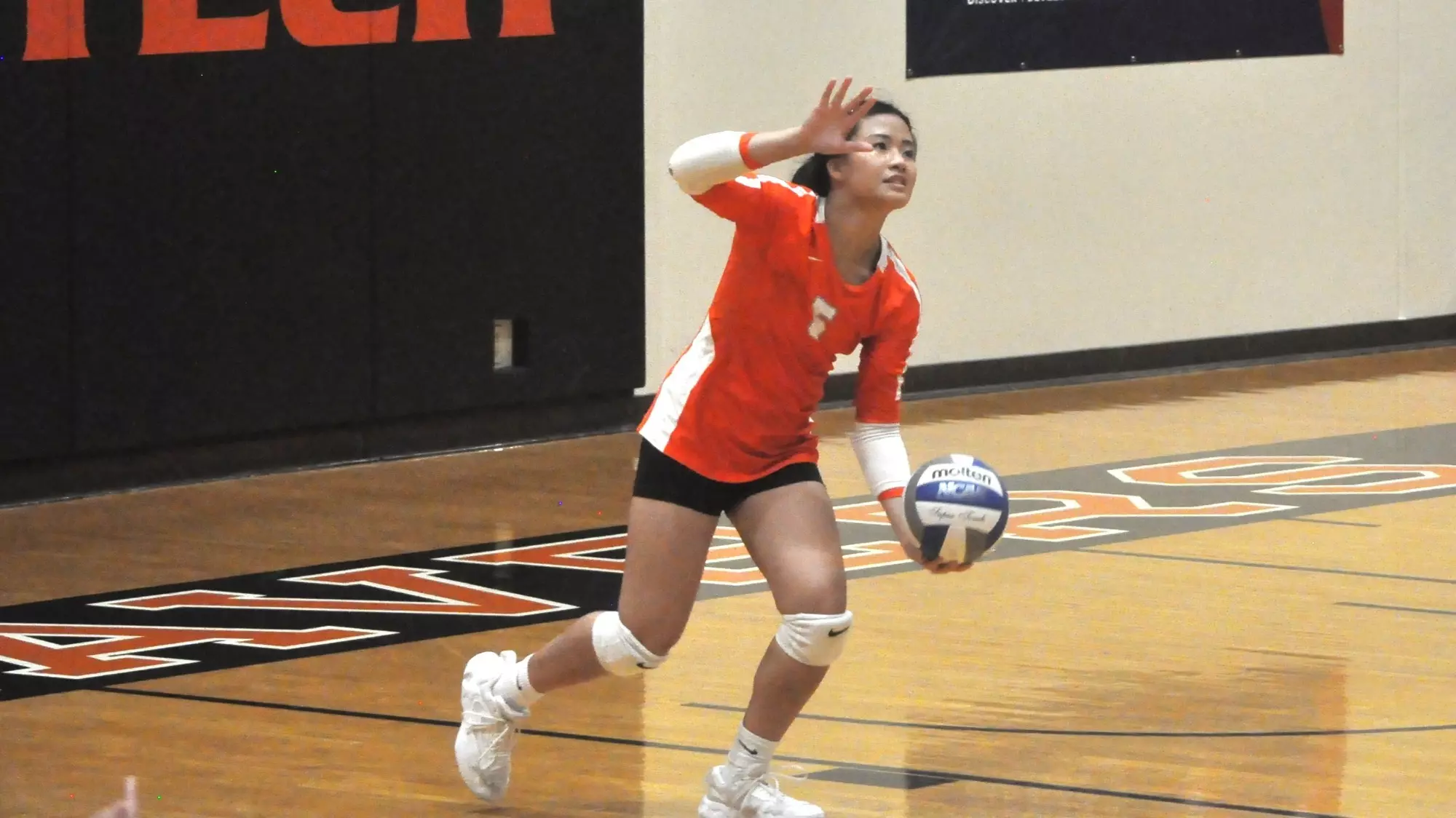Lana Saopraseuth prepares to serve the ball