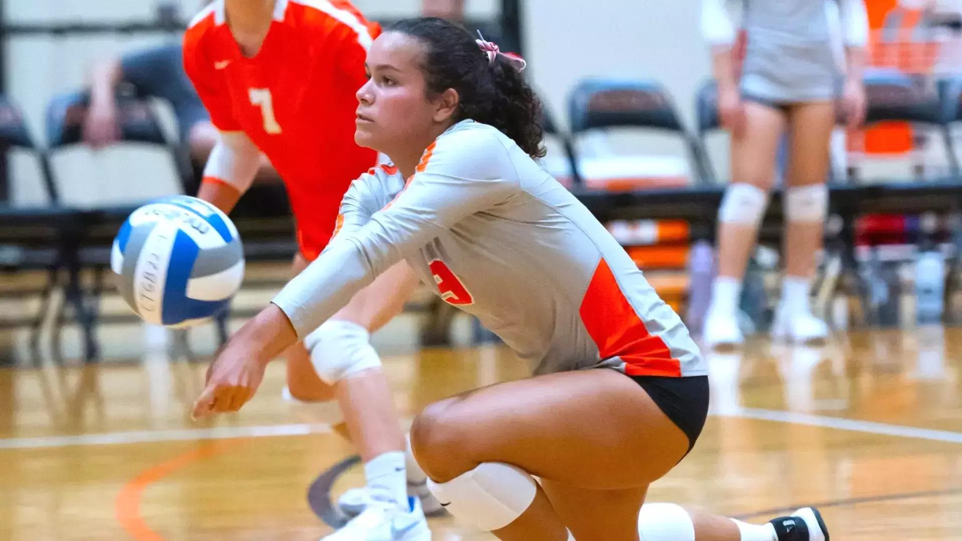 Photo of Caltech volleyball first-year Brittany Rosario coming up with the dig in the team's Sep. 7 match versus Hope International