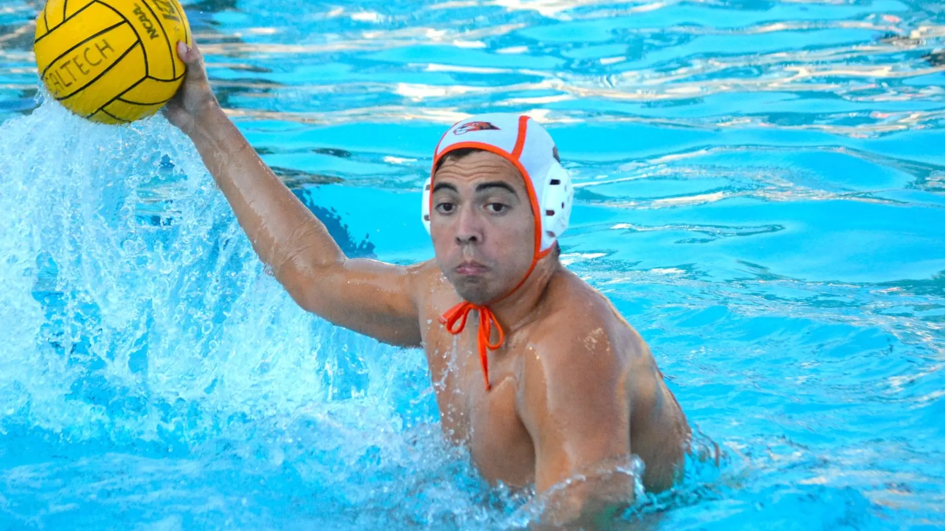 Men's water polo's Andres Heredia with the ball at Braun Pool