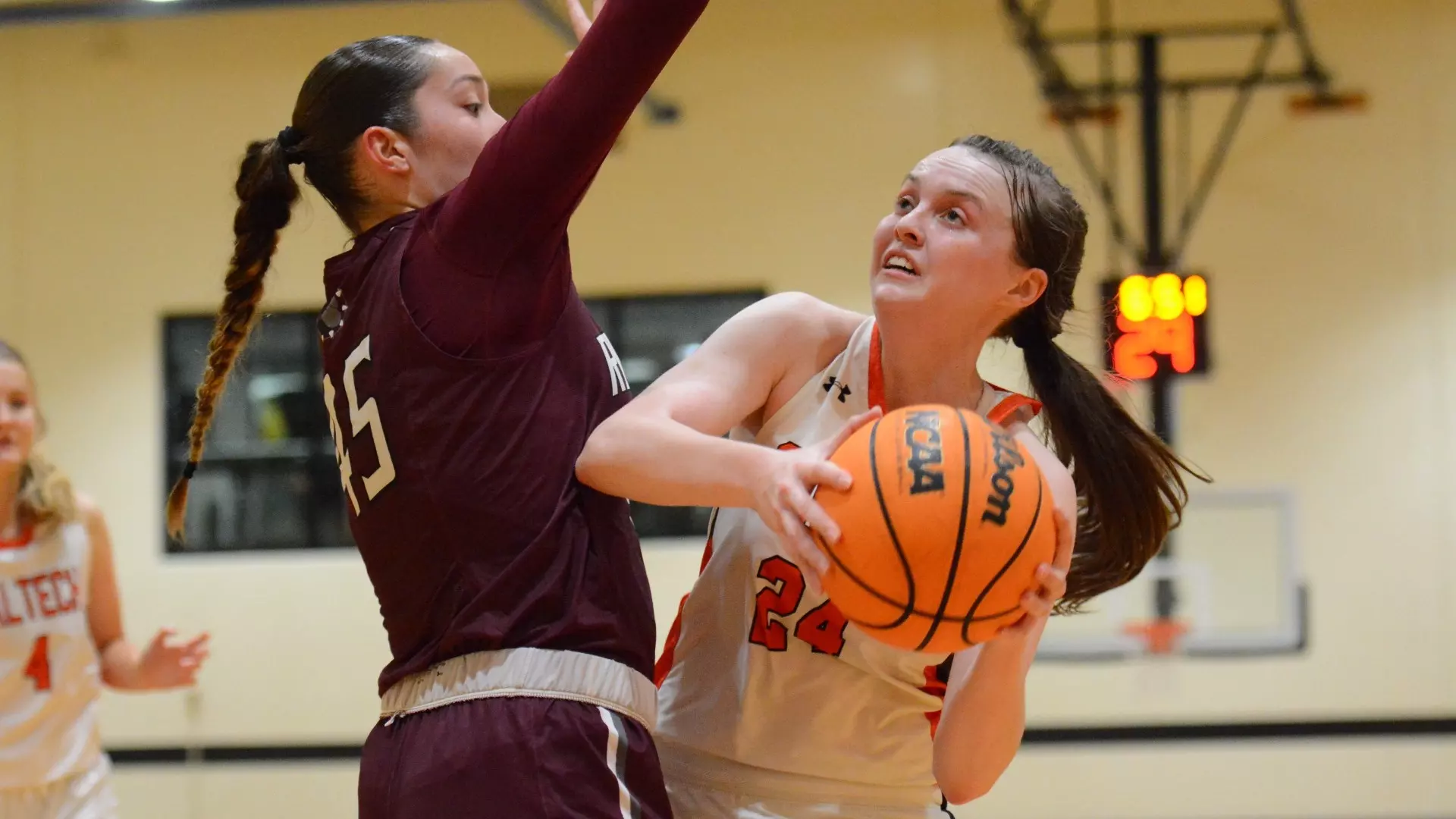 Kathryn Edwards driving toward the basket