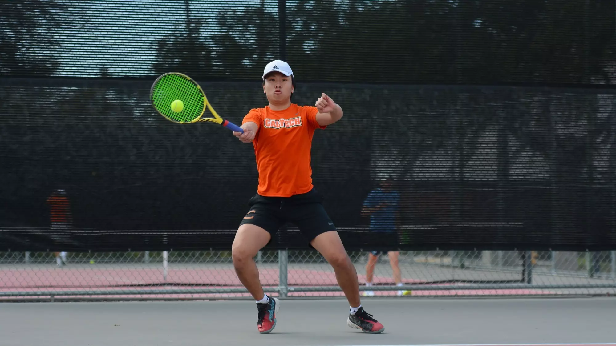 Eric He playing singles