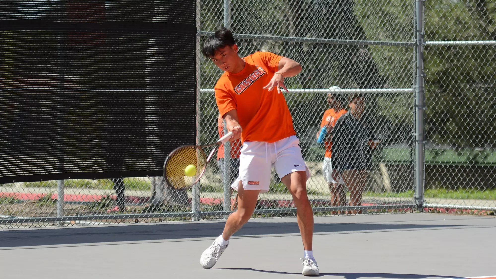 Kenneth Chan returns a ball with his forehand