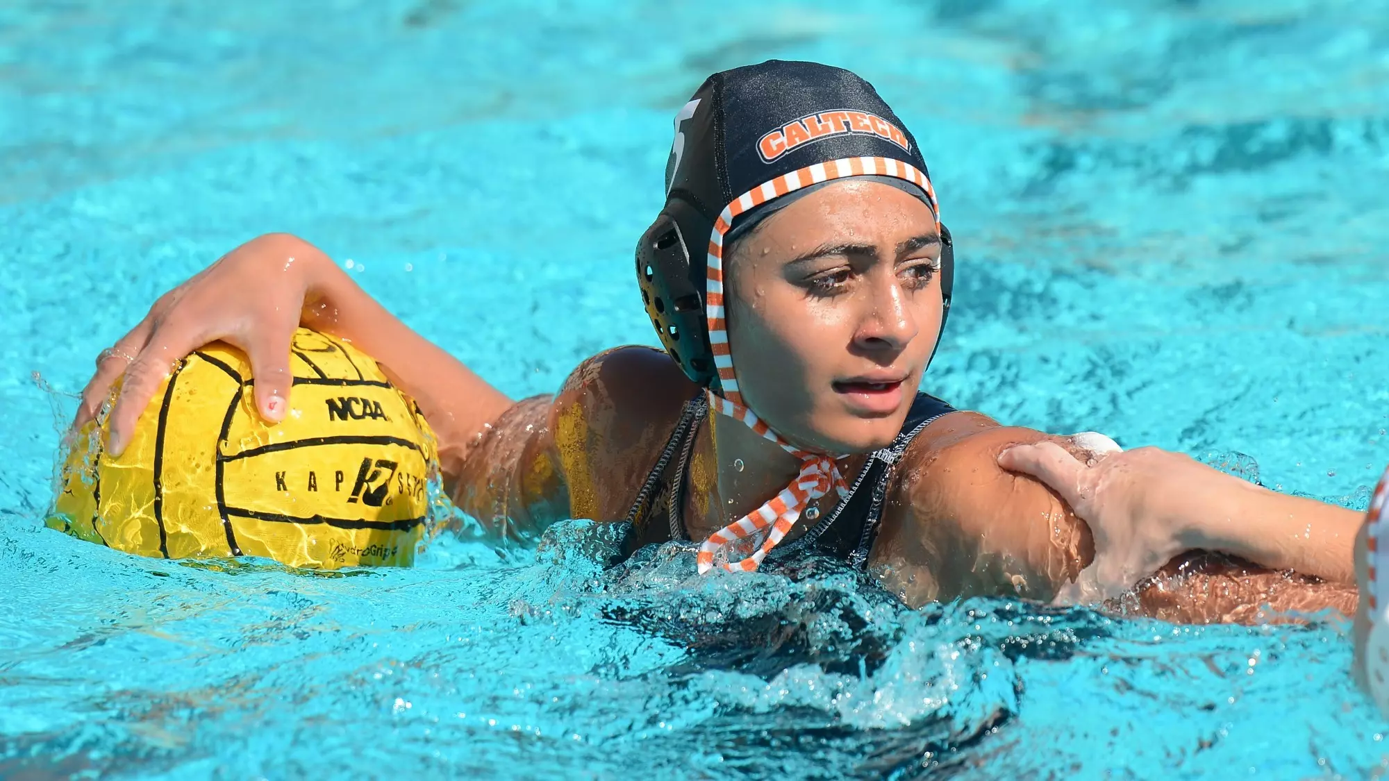 Diya Kumar protects the ball while a defender guards her