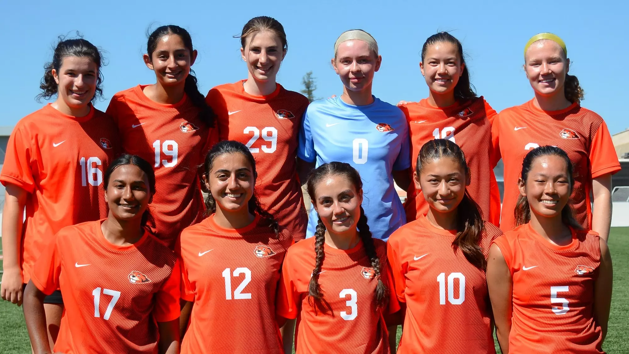 Caltech Women's Soccer team's opening day roster poses together before the match