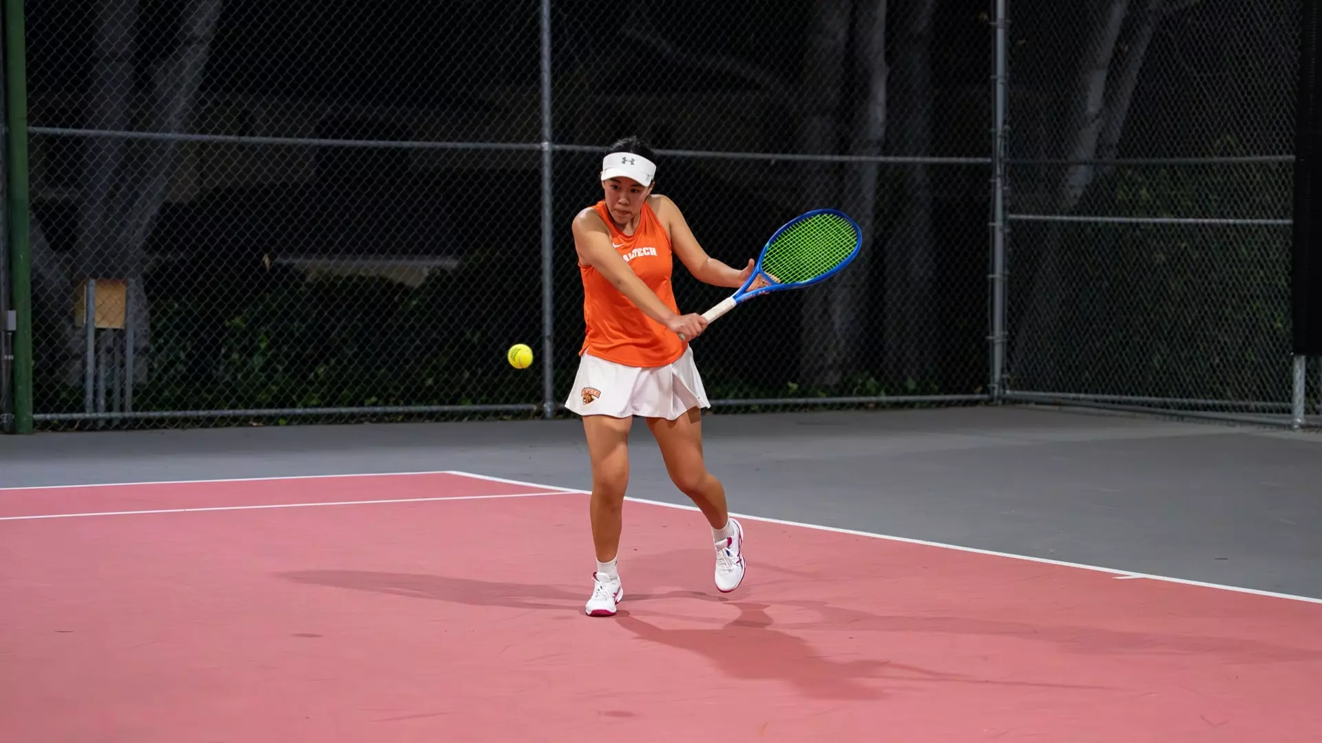 Tara Zhan returns a ball with her backhand