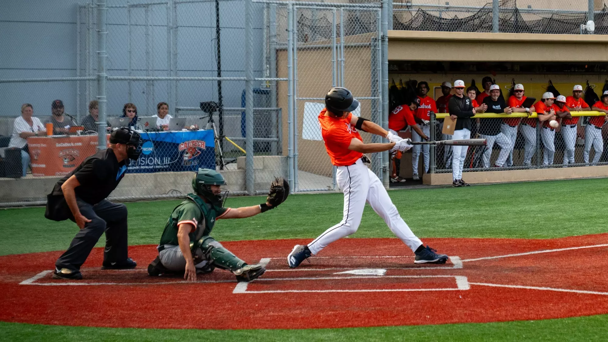 Mark Hu makes contact with a pitch against La Verne as viewed from the first base side