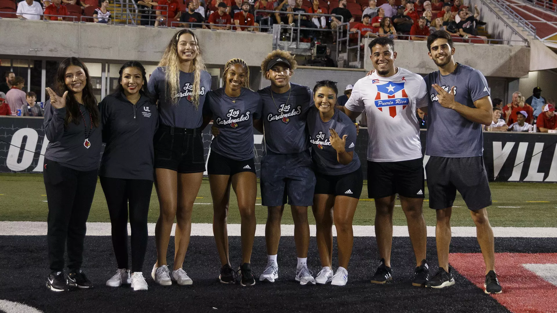 Members of Louisville’s Los Cardenales student-athlete group 