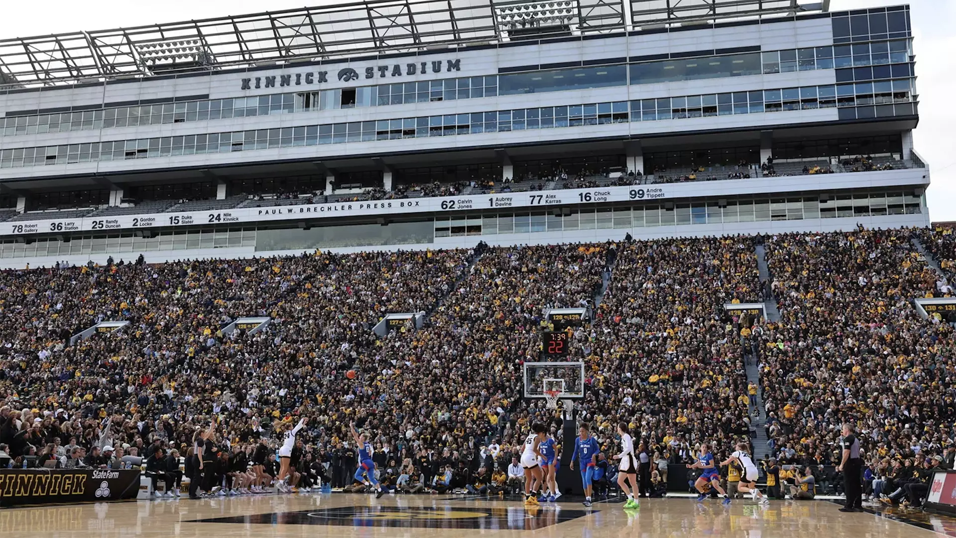 This photo is of the Iowa Hawkeyes setting the NCAA women's basketball attendance record at Kinnick Stadium.