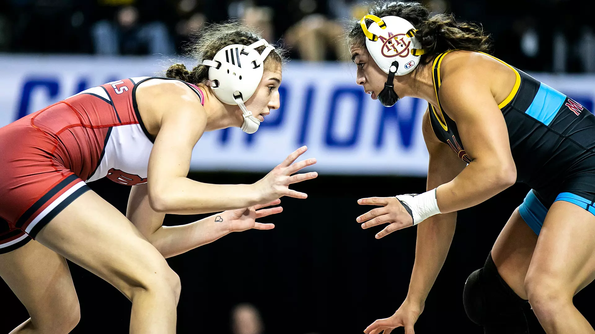 Amani Jones (left) of North Central (Illinois) wrestles Colorado Mesa’s Marissa Gallegos during the National Collegiate Women’s Wrestling Championships in March at the Alliant Energy PowerHouse in Cedar Rapids, Iowa. 