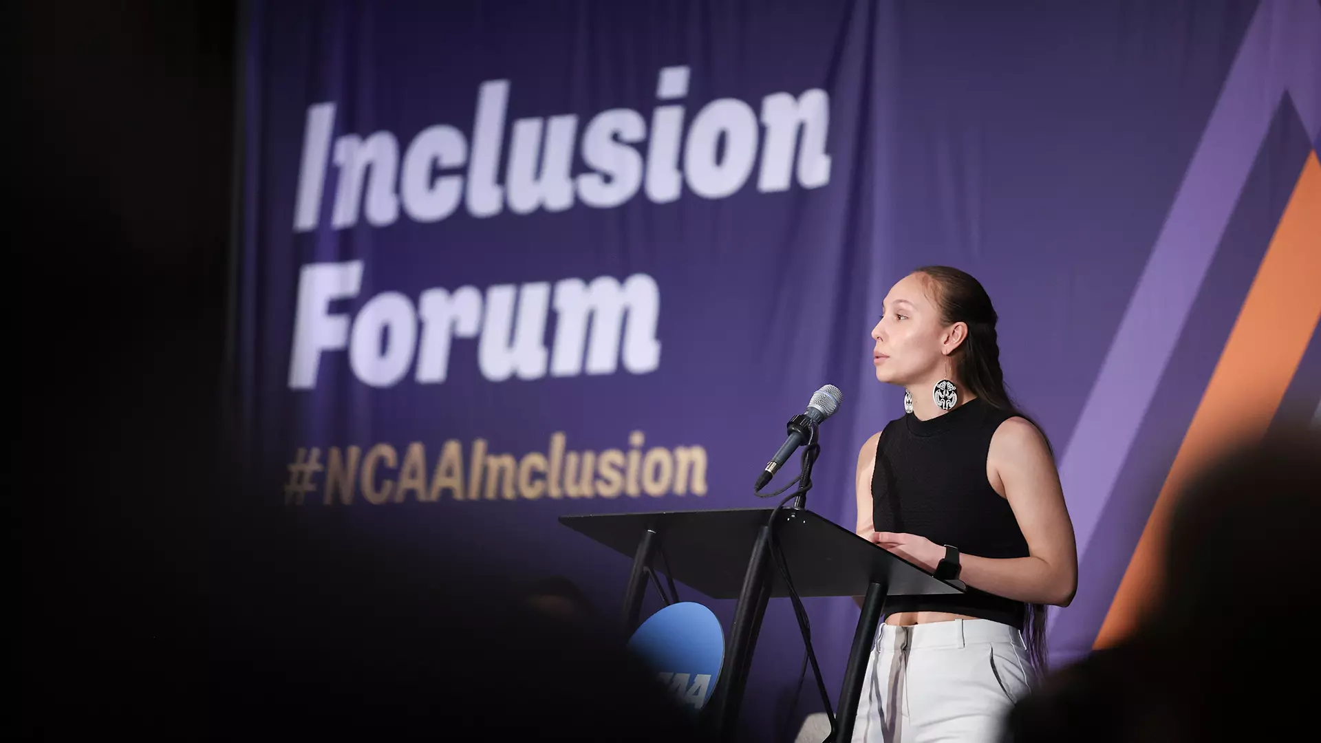 Rosalie Fish, a senior runner at Washington, spoke at the 2023 NCAA Inclusion Forum in Indianapolis