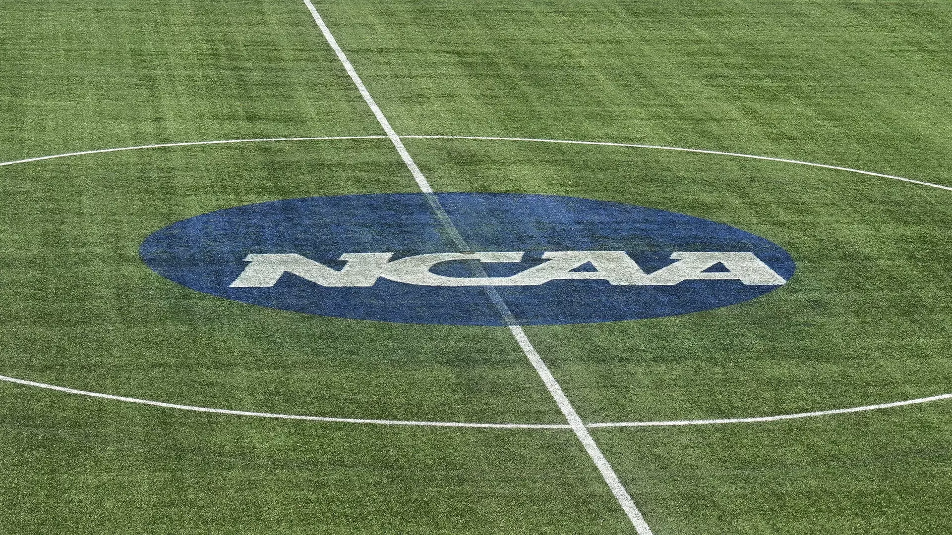 Soccer field with NCAA blue disc