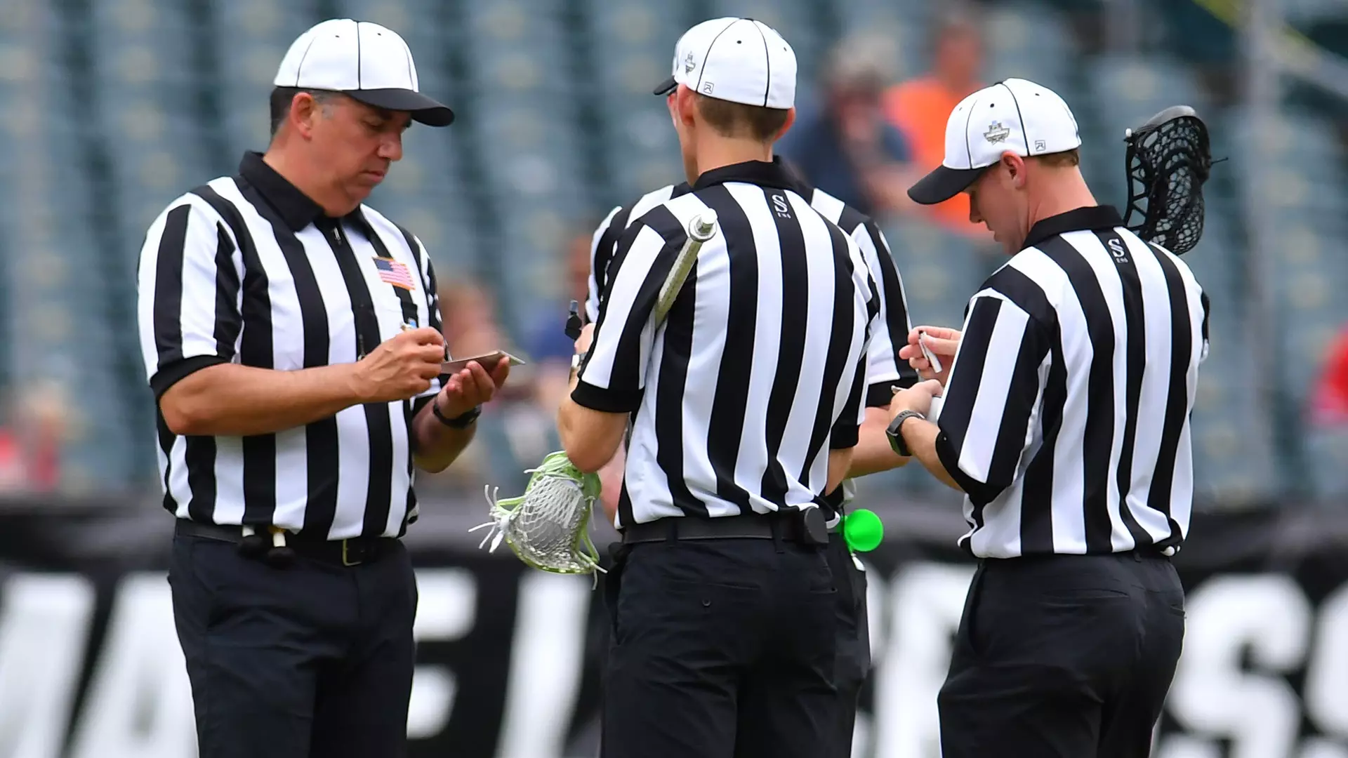 Referees confer at the NCAA Men’s Lacrosse Championship.