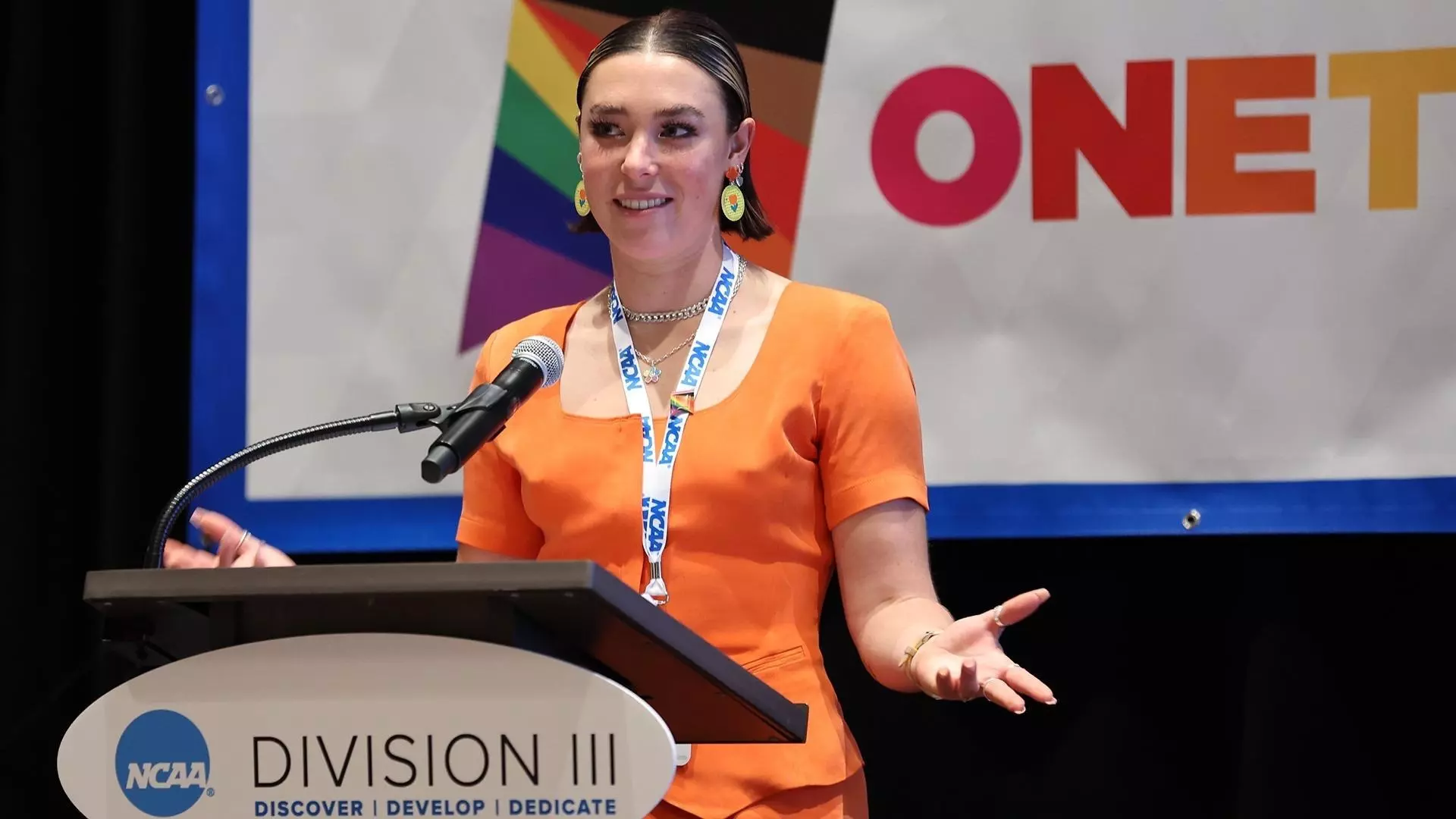 Elise Morris accepts her award as the 2022 Division III LGBTQ Student-Athlete of the Year at the 2023 NCAA Convention. 