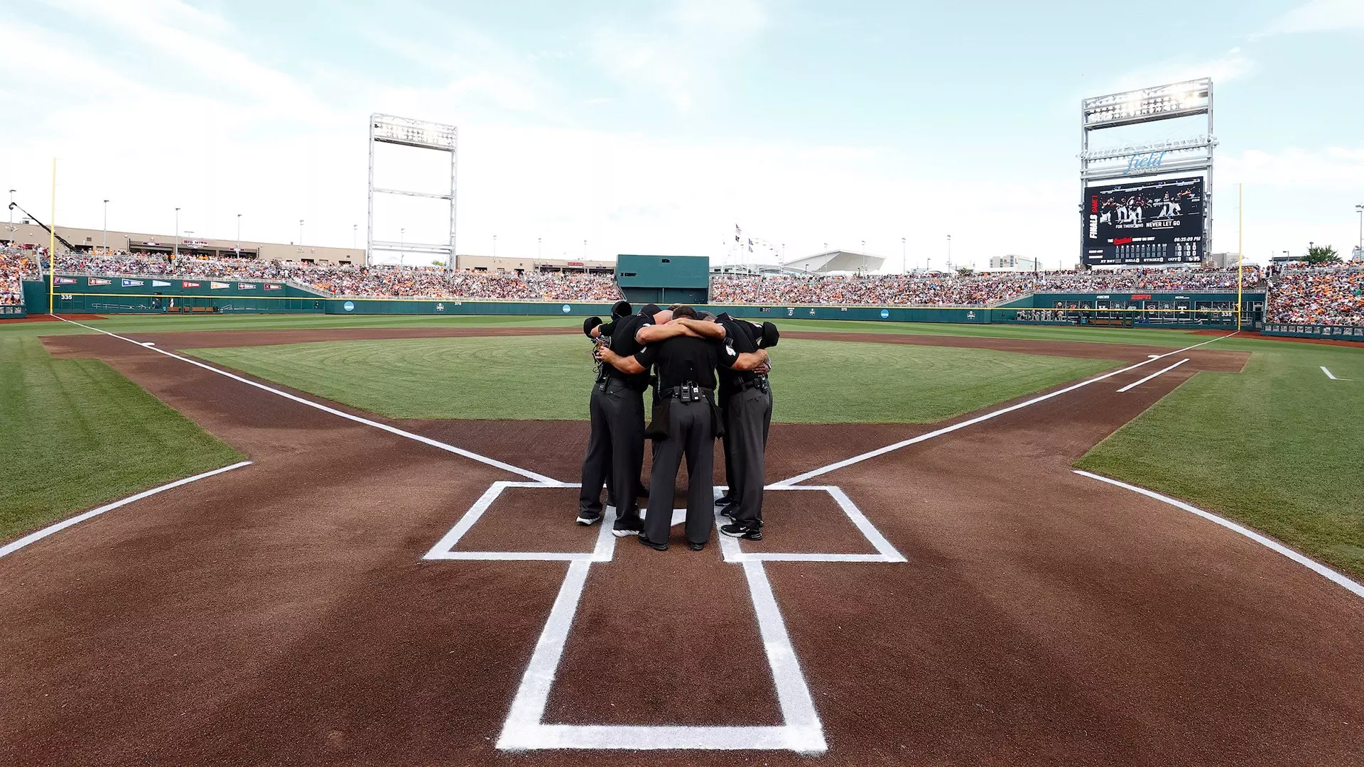 Baseball Umpires Huddle