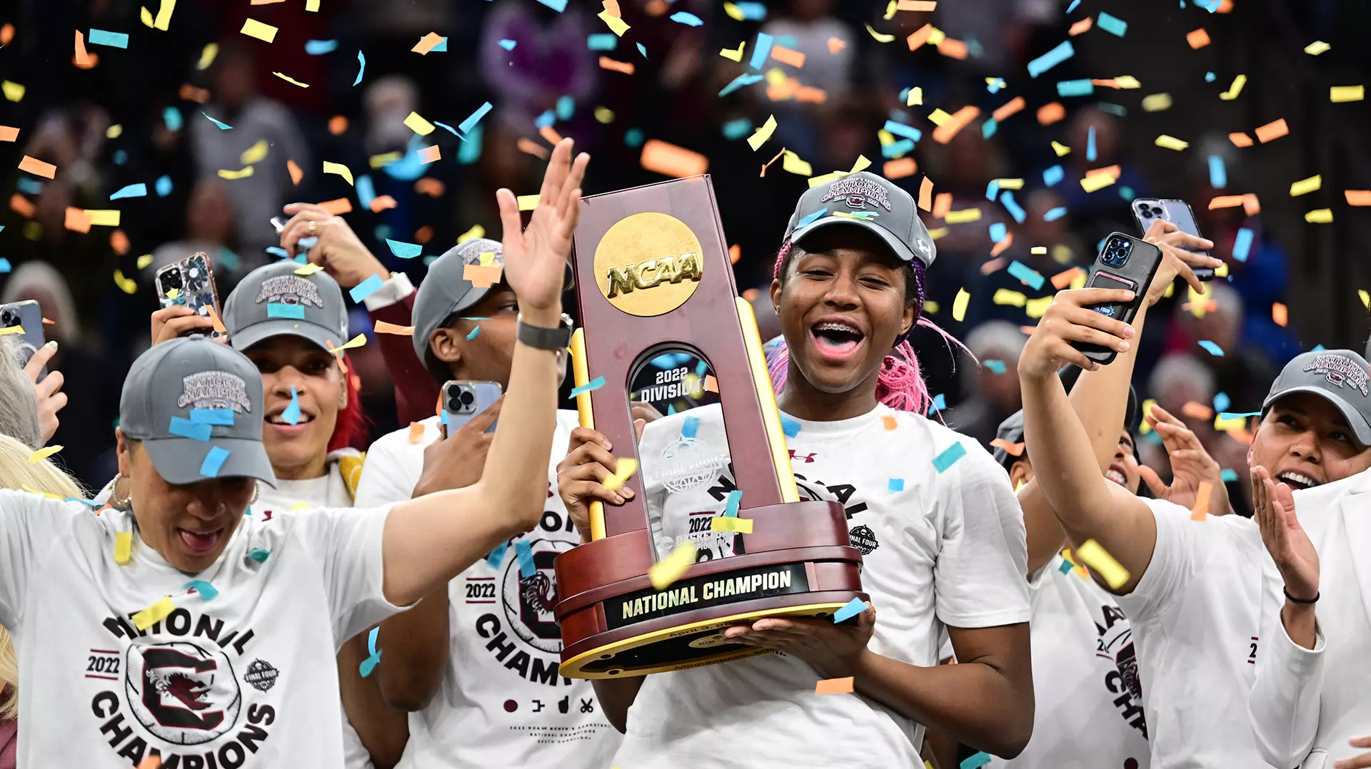 Aliyah Boston of the South Carolina Gamecocks holds the trophy after their win over the UConn Huskies during the title game of the 2022 NCAA Division I Women’s Basketball Championship at the Target Center in Minneapolis. 