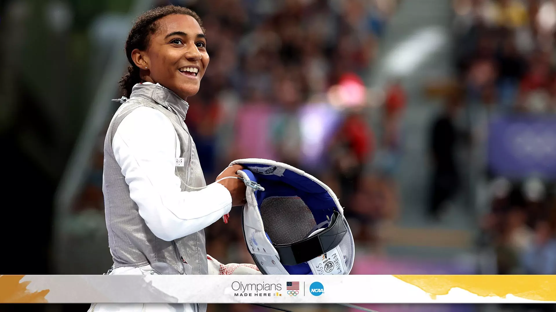 Lauren Scruggs, who will be a senior at Harvard, smiles after winning the silver medal in the individual foil event at the 2024 Paris Olympics, becoming the first Black woman in history to achieve this milestone in fencing. 