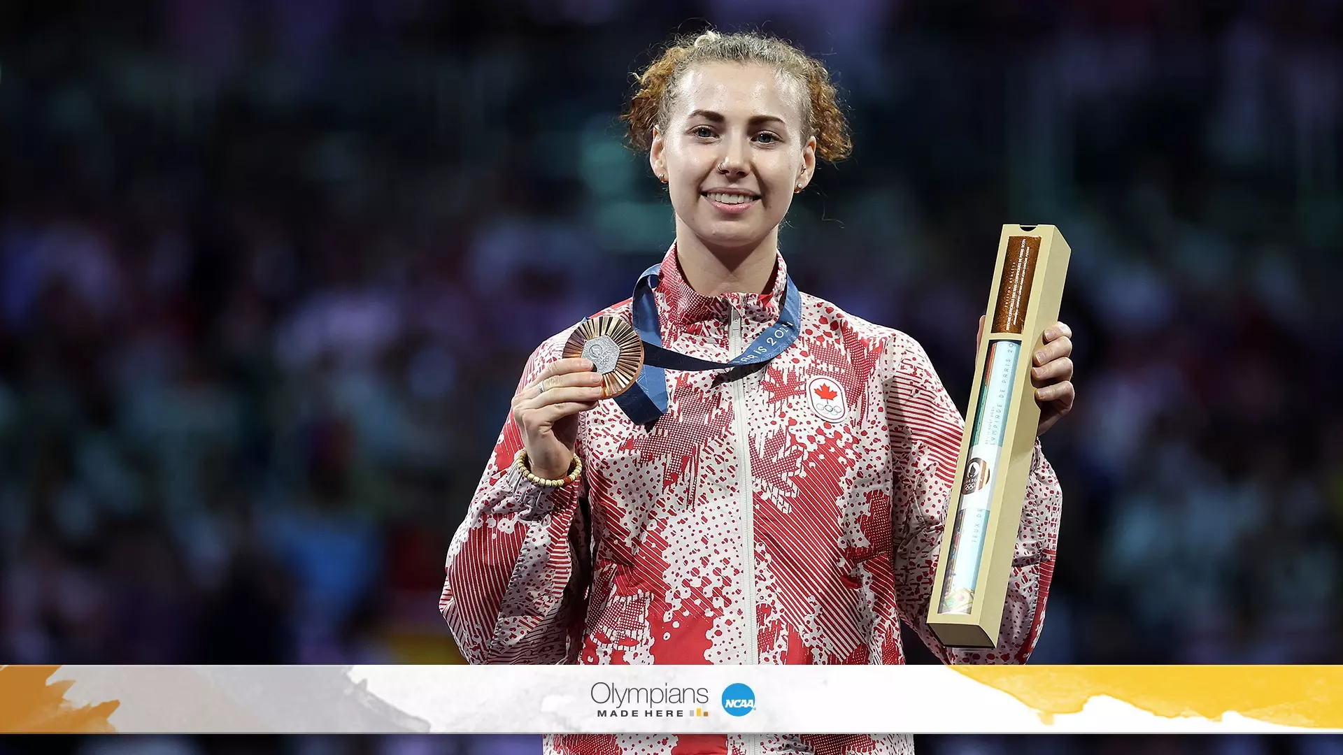 Ohio State’s Eleanor Harvey shows off her bronze medal. At the Paris Games, she won Canada’s first medal in fencing. 
