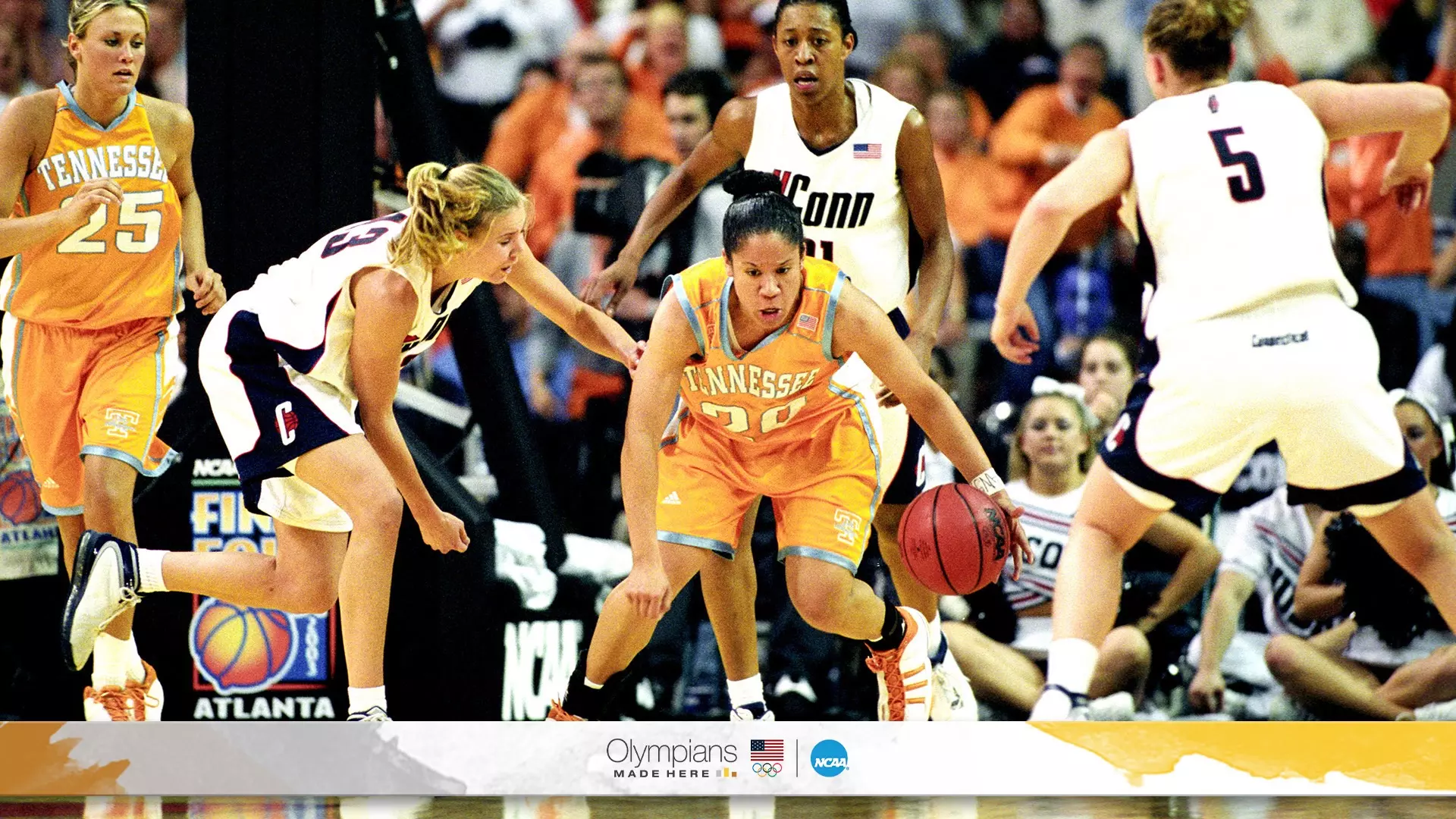 Guard Kara Lawson (20) of the University of Tennessee dribbles out of a jam against the University of Connecticut