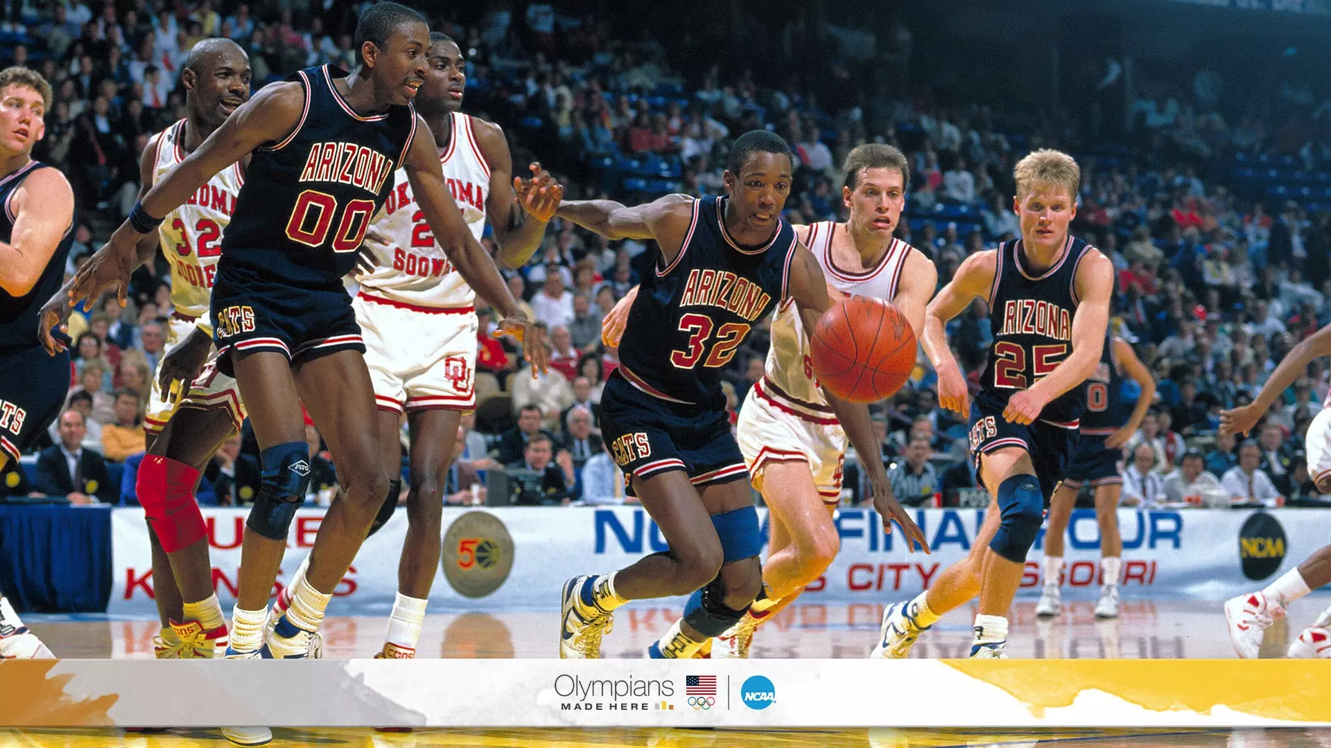 Arizona forward Sean Elliott (32) chases down a loose ball during the NCAA Men's National Basketball Final Four semifinal game held in Kansas City, MO, at the Kemper Arena. Oklahoma defeated Arizona 86-78 to meet Knasas in the championship game. Also pictured Arizona forward Anthony Cook (00), guard Steve Kerr (25) and Oklahoma forward Andre Wiley (32) and forward Dave Sieger (44). 