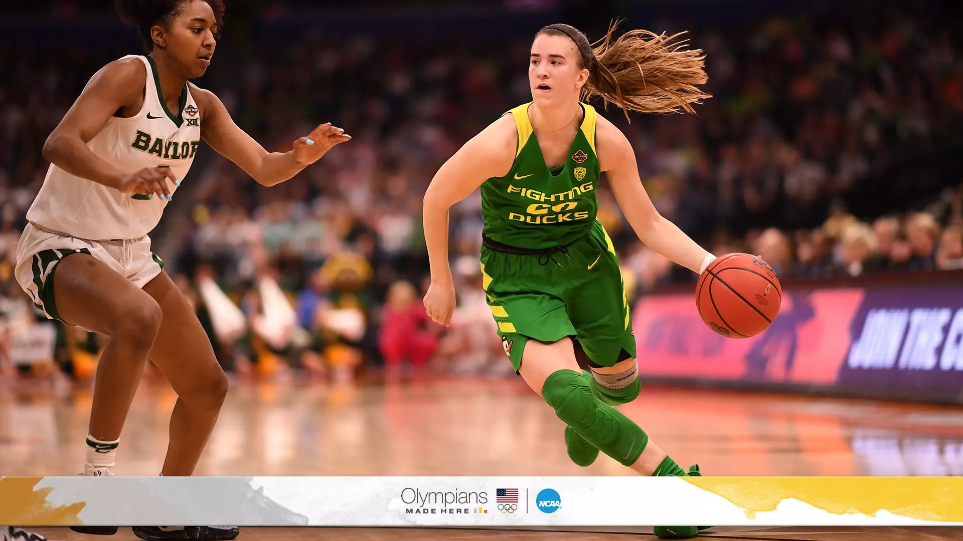 Sabrina Ionescu #20 of the Oregon Ducks dribbles past DiDi Richards #2 of the Baylor Bears