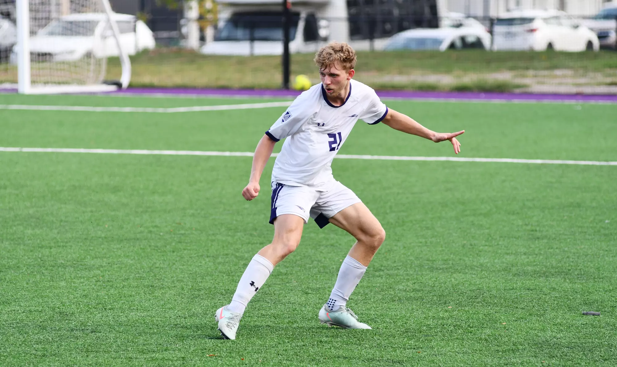 Taegan Schnurr plays defense against Lyon College.