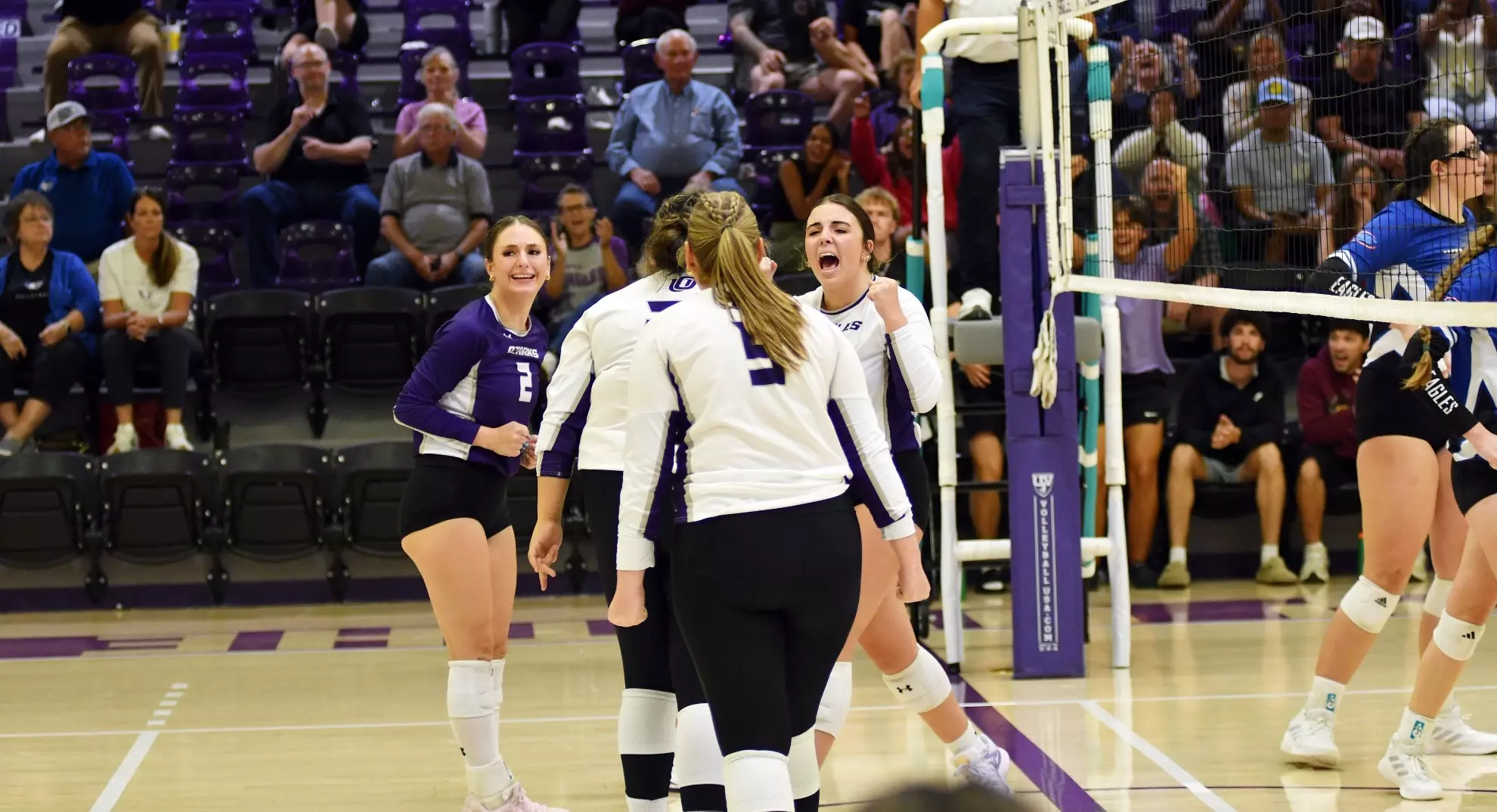 The Eagles celebrate the program's first ever win.