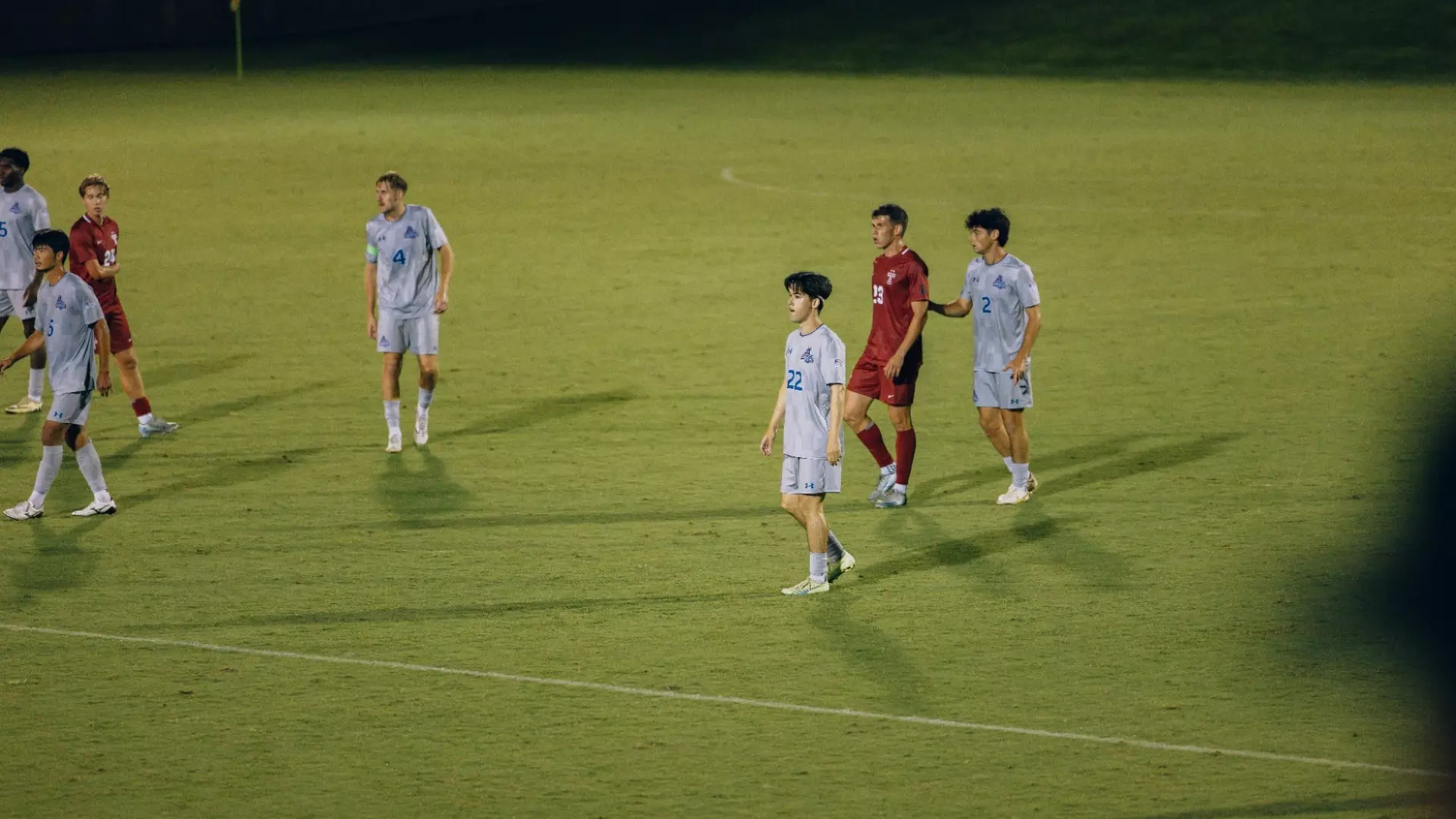 Toshi Davis of the American University soccer team walks down the field during a game against Temple University
