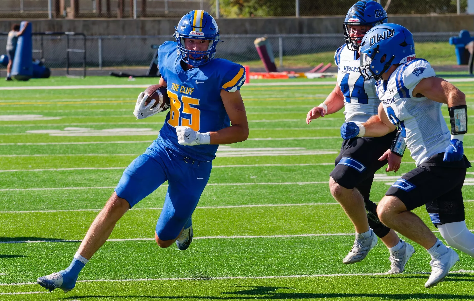 Whiting running with ball 