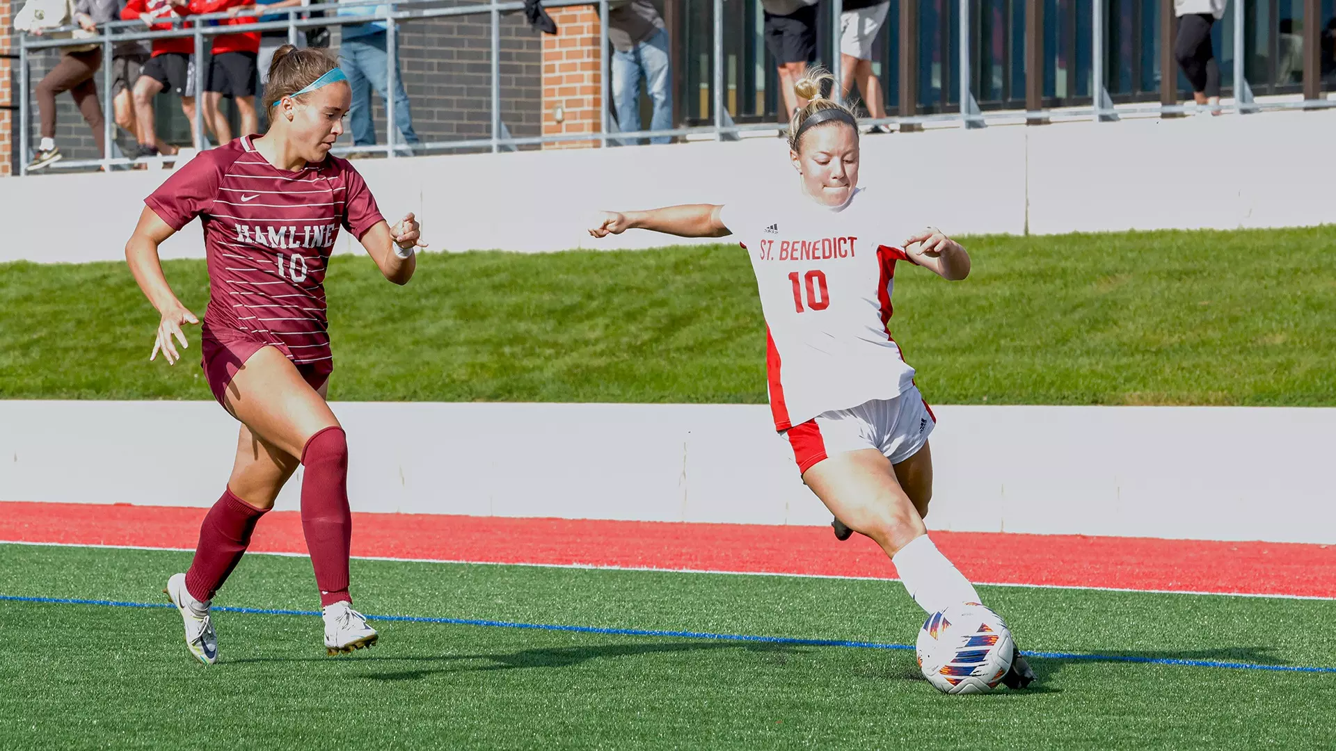 Alli Voss scores against Hamline 2023