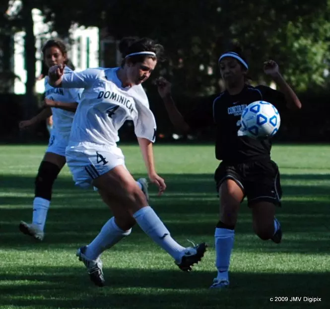 Liz Phipps clears the ball