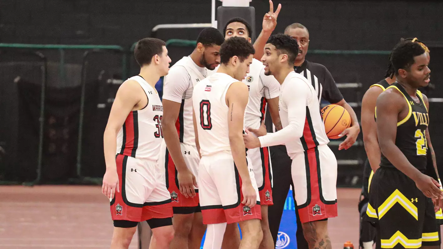 ESU Men's Basketball huddle