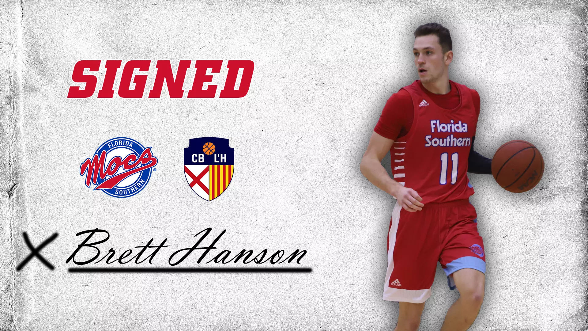 Brett Hanson signs in Spain