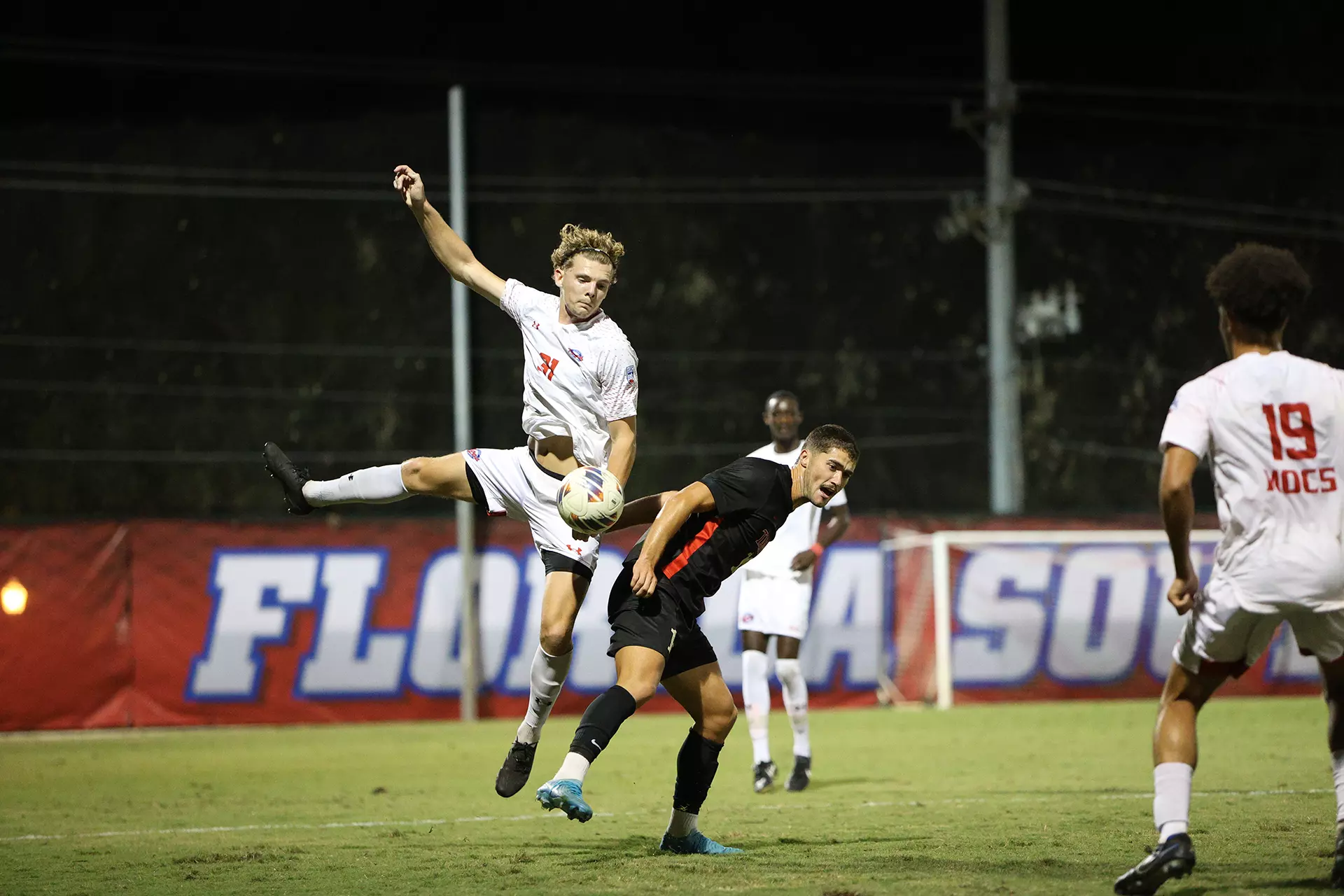 Ruben Linden heading a ball over tampa