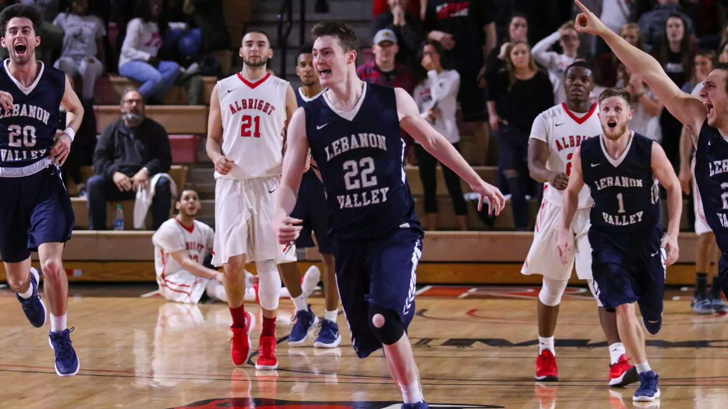 men's basketball celebrates conference title after final buzzer at albright