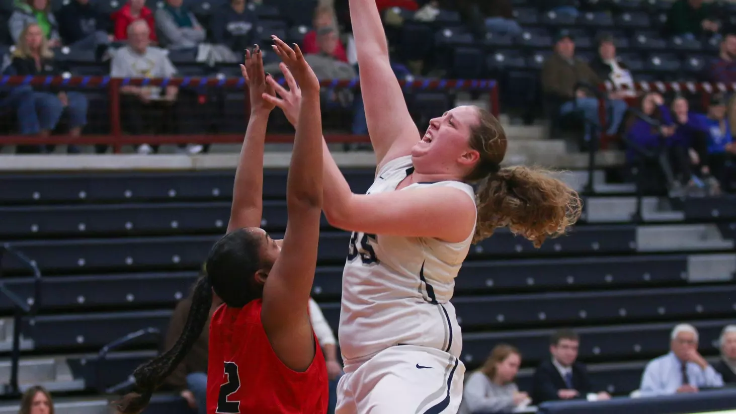 emily mealey goes up for a shot in the lane against albright