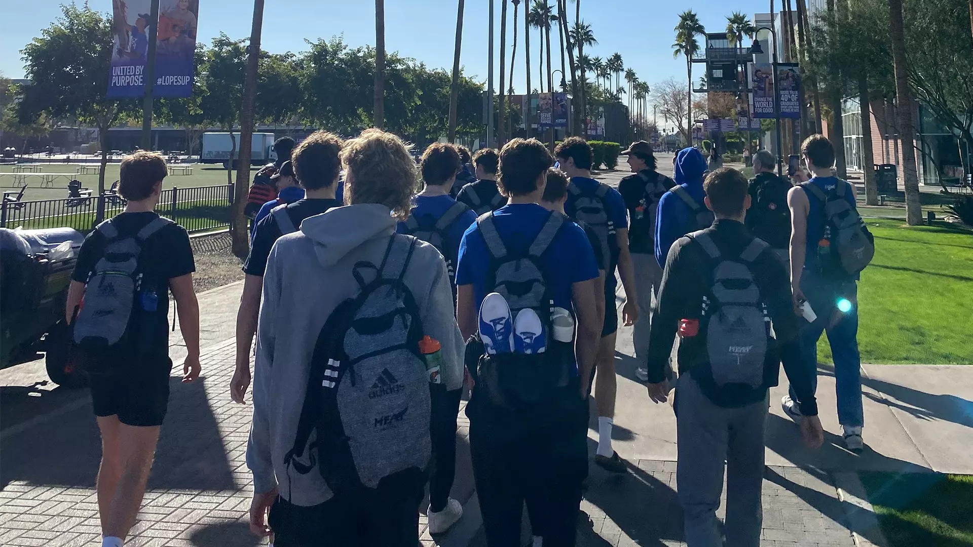 Members of the UBCO Heat men's volleyball team walk on the Grand Canyon University campus during the team's trip to Phoenix.