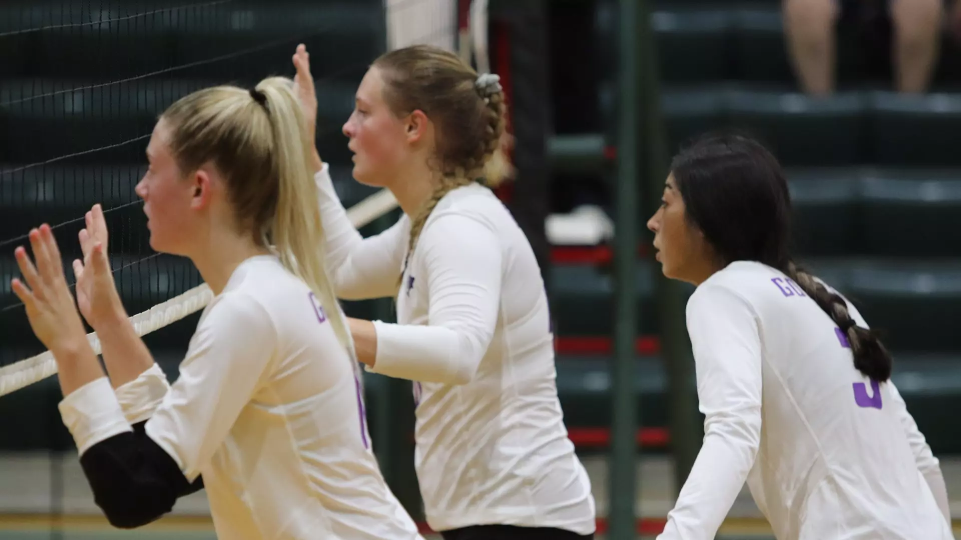 Goshen's front line awaits a serve.