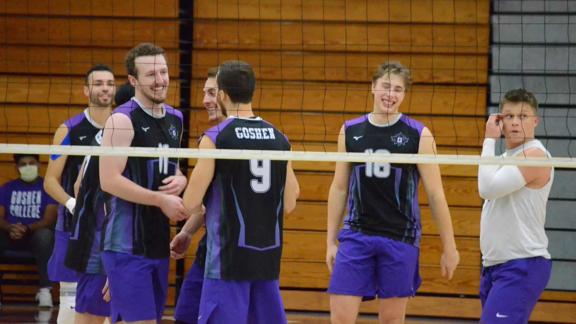 Men's volleyball celebrates after sweep